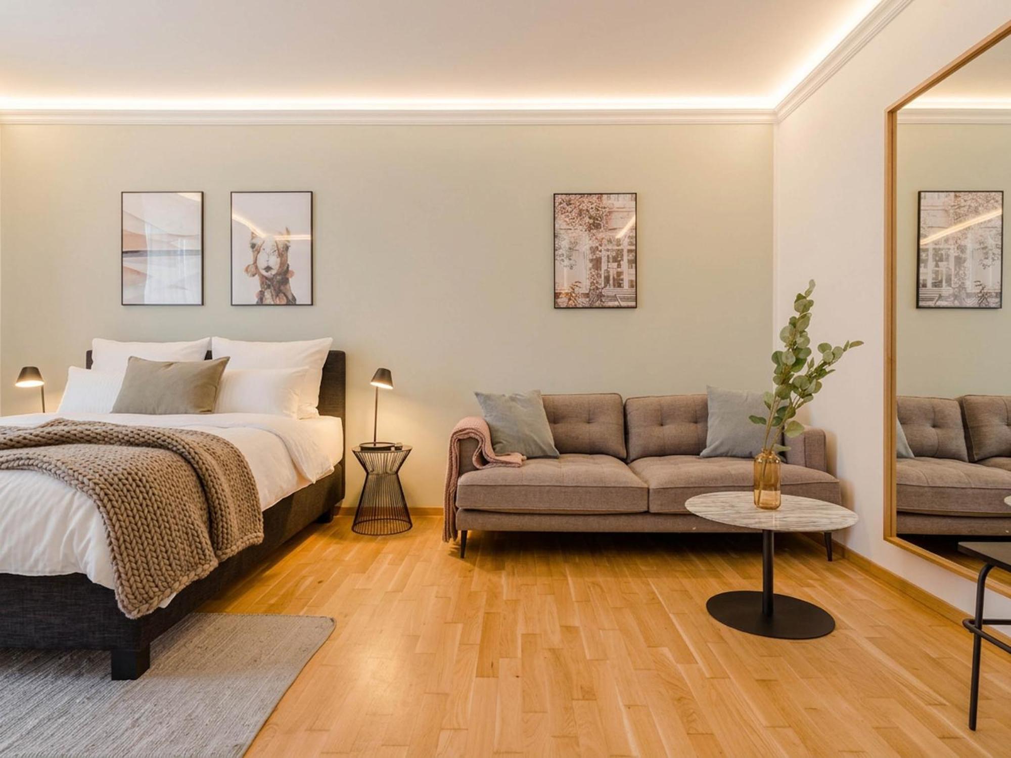 Suite L with sofa bed, terrace & courtyard view
